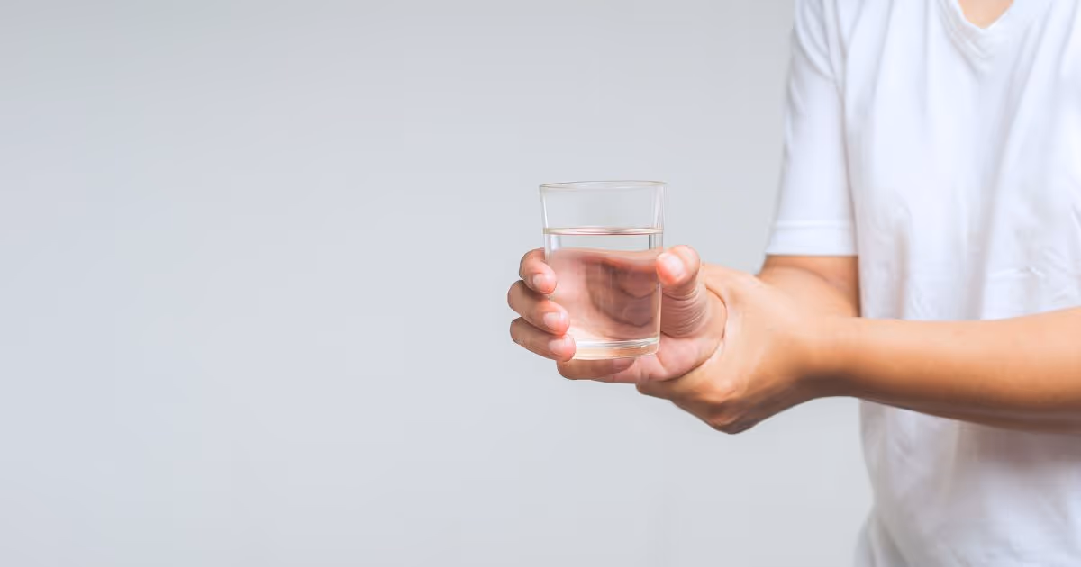 Is it true that hand tremor is a specific sign of Parkinson's disease?