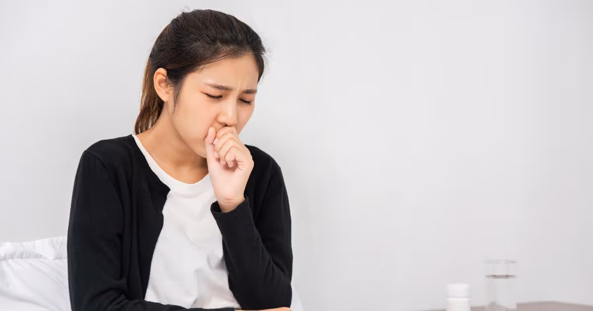 Woman Coughed Covered Her Mouth With Her Hand Sat Bed