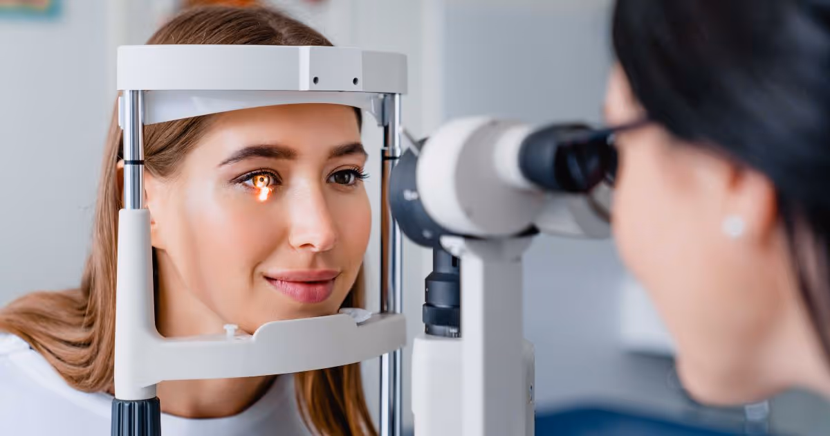 Eye examination before laser or eye surgery: A woman is undergoing a comprehensive eye examination before laser treatment or eye surgery.